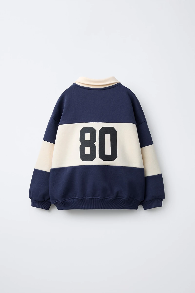 EMBROIDERED ANIMAL STRIPED POLO SWEATSHIRT