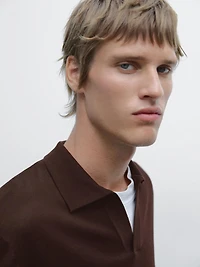 Knit sweater with a polo collar