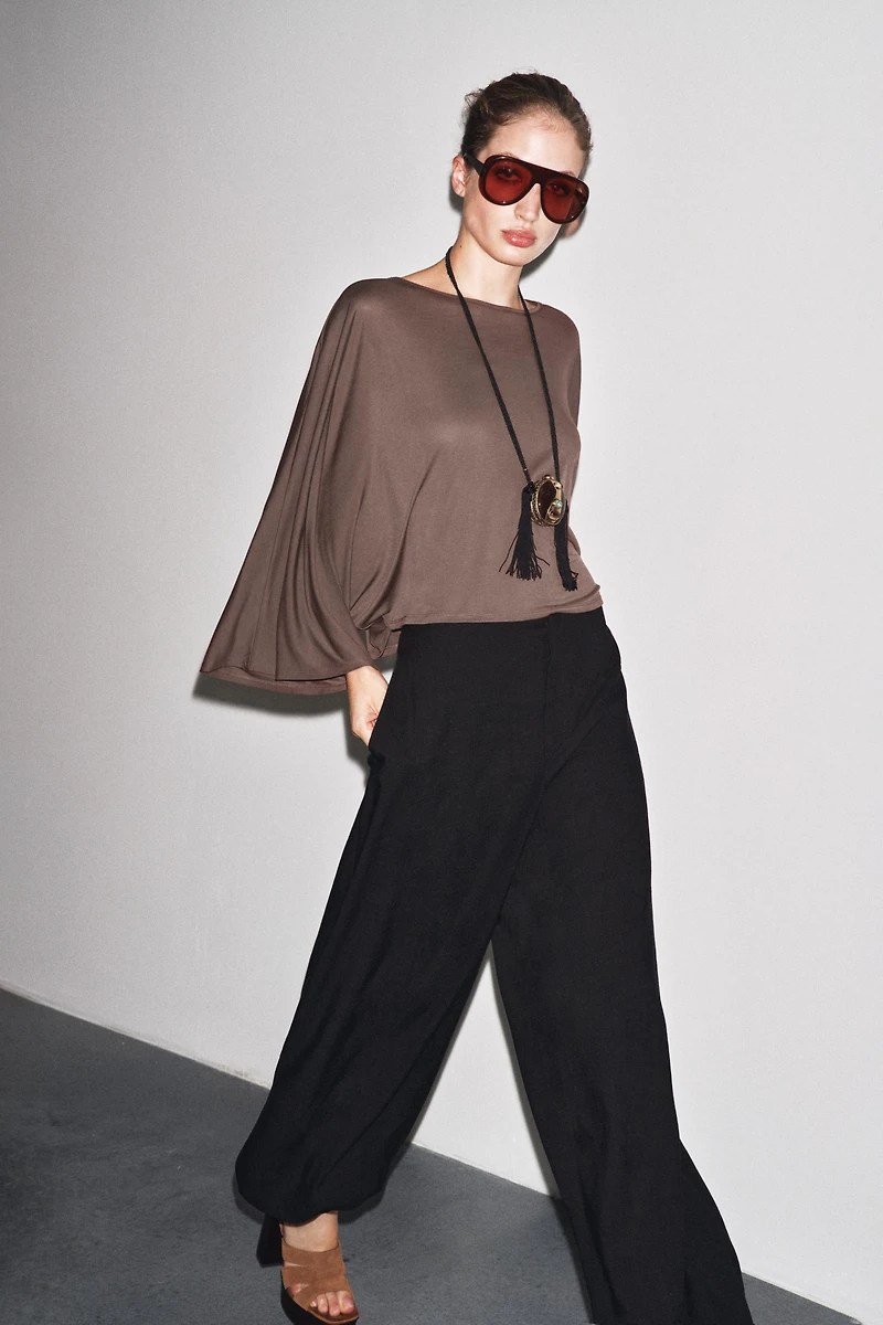 ASYMMETRIC FLOWY CAPE