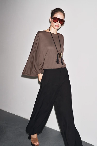 ASYMMETRIC FLOWY CAPE