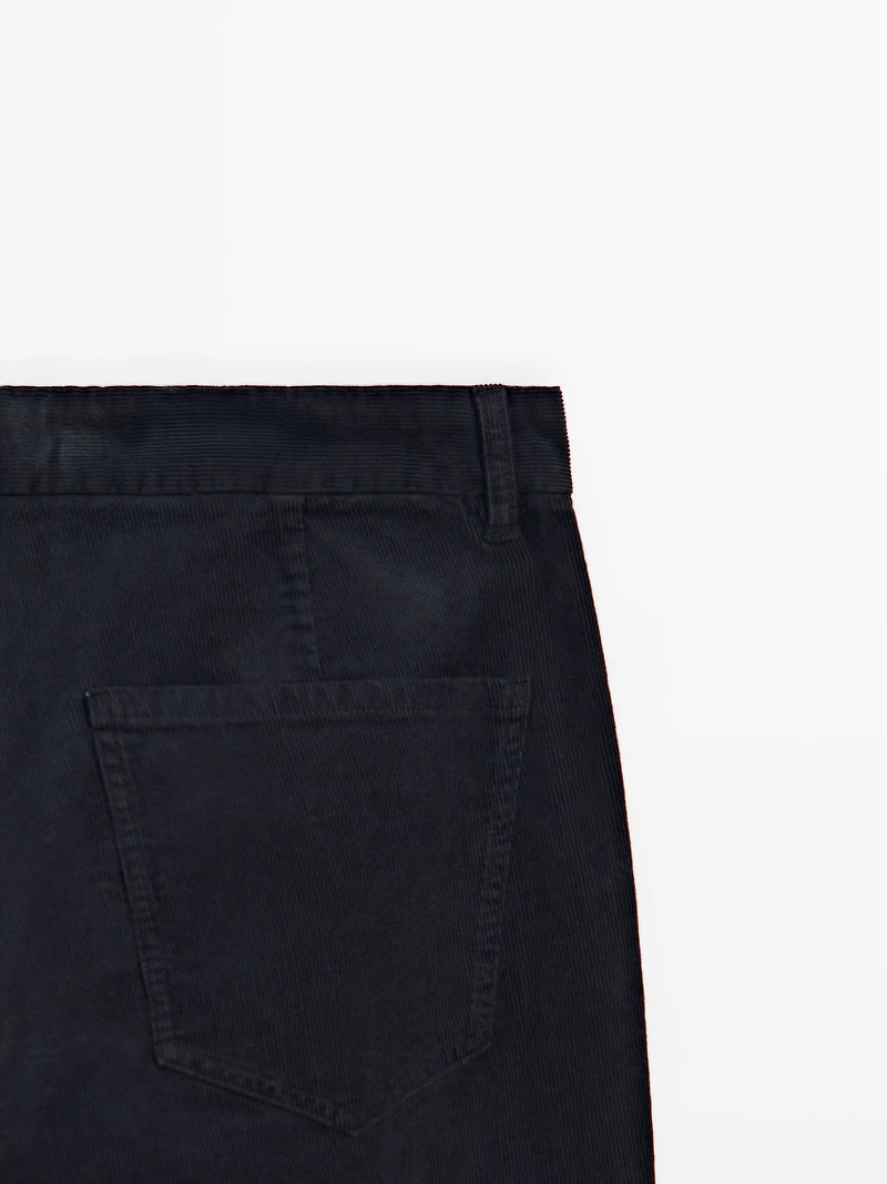 Faux jean en velours côtelé coupe slim