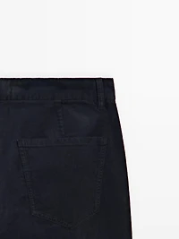 Faux jean en velours côtelé coupe slim