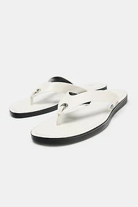 SANDALES PLATES EN CUIR