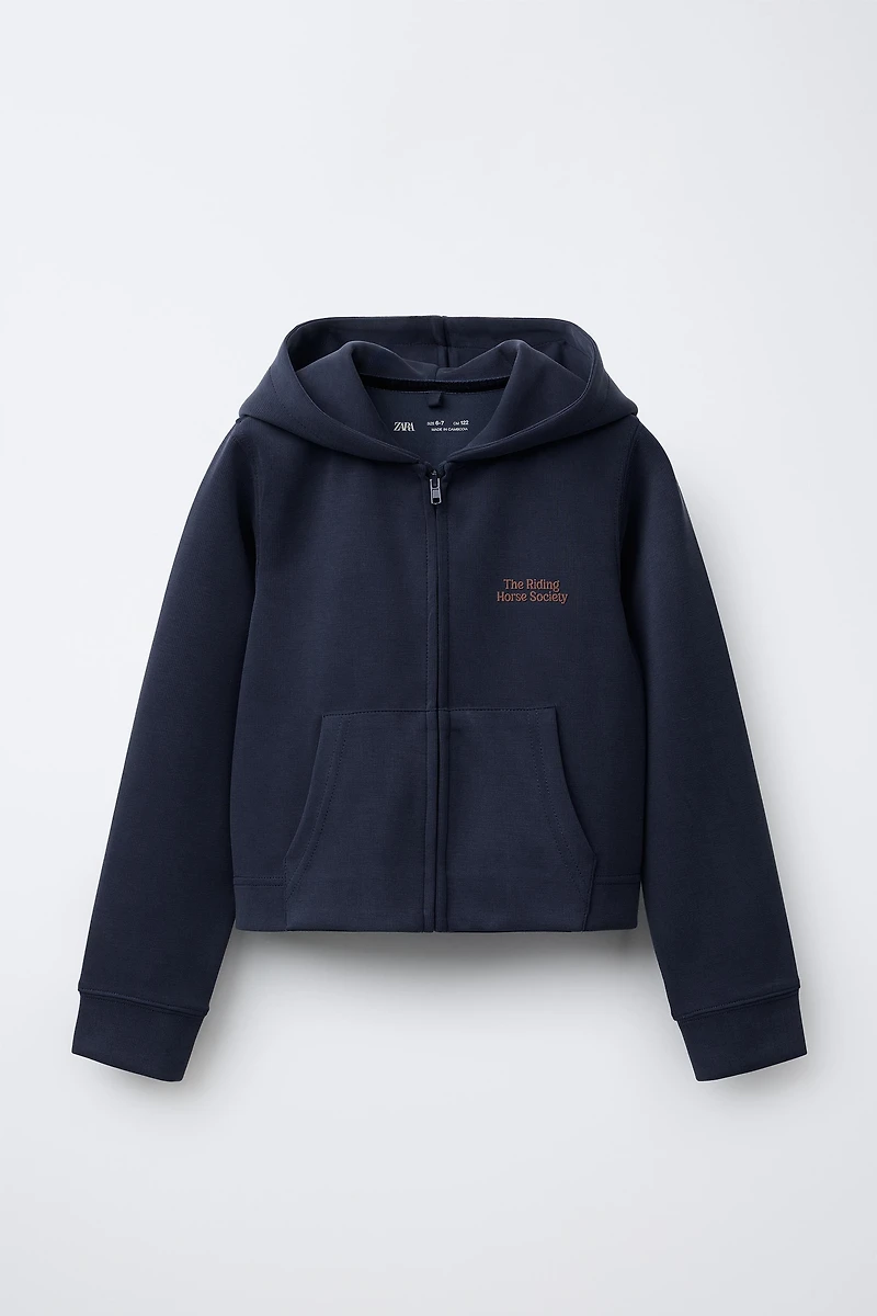 RAISED TEXT HOODED SWEATSHIRT