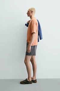 IRREGULAR FINISH KNIT T-SHIRT