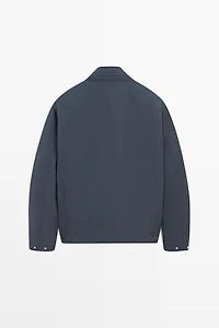 Technical fabric jacket with pocket details