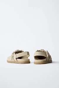 SABOTS EN CUIR AVEC FLEURS