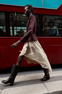 VESTE PEPLUM EFFET DAIM CEINTURÉE