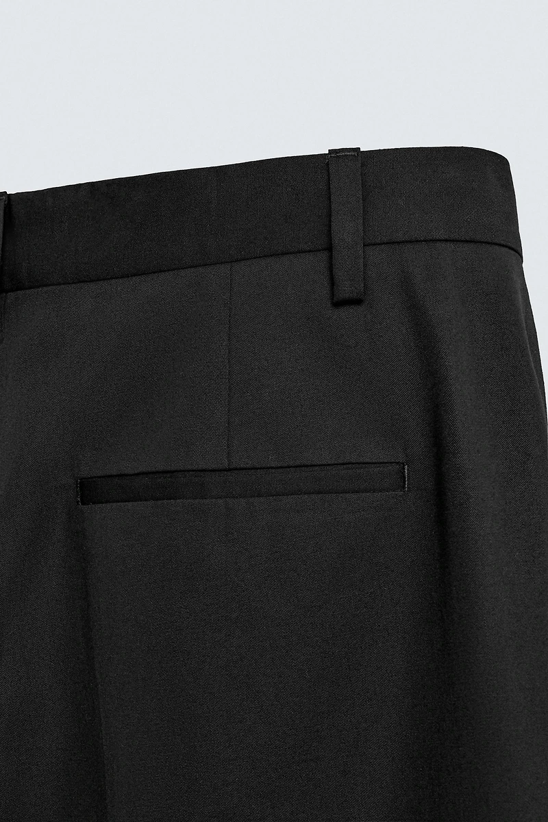 LIMITED EDITION PLEATED SUIT PANTS