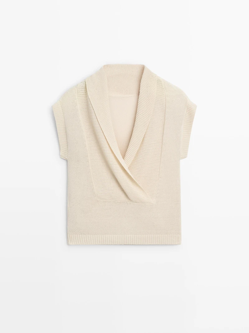 Knit sweater with low-cut back