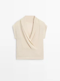 Knit sweater with low-cut back