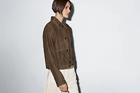 Short suede leather jacket with pocket details