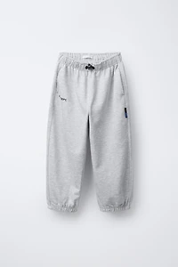 PANTALON DE JOGGING EN MOLLETON STOPPEURS