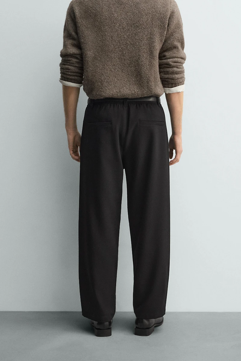 RELAXED FIT PLEATED PANTS