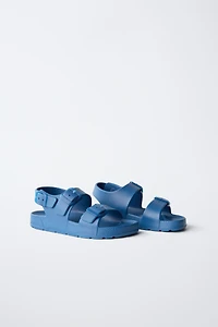 RUBBERIZED BUCKLED SANDALS