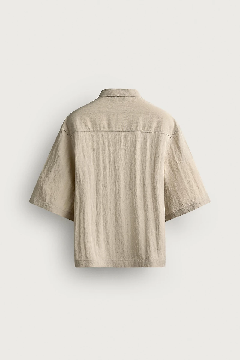 FLOWY POLO SHIRT