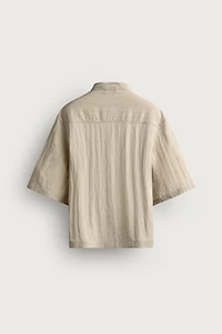 FLOWY POLO SHIRT