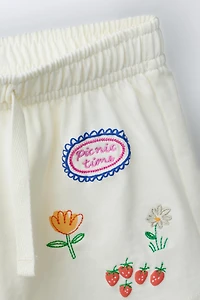EMBROIDERED PLUSH SHORTS