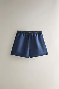 SOLID CONTRAST SWIM TRUNKS