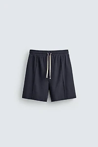 TEXTURED JOGGER SHORTS