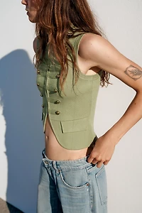 GILET EN MAILLE AVEC BRANDENBOURGS