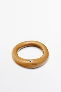 Ceramic tubular bracelet with star detail