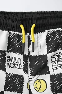 6-14 YEARS/ CHECKERBOARD SMILEYWORLD ® SWIM SHORTS