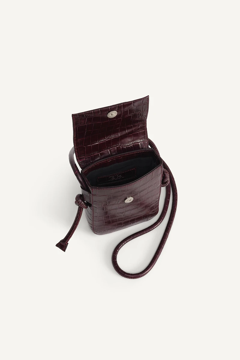LIMITED EDITION EMBOSSED LEATHER CROSSBODY BAG