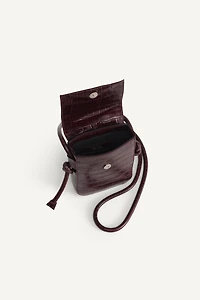 LIMITED EDITION EMBOSSED LEATHER CROSSBODY BAG