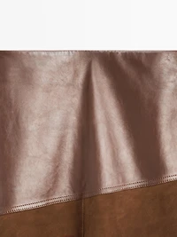 Jupe asymétrique en cuir nappa et daim avec empiècement