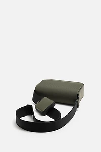TEXTURED RUBBERIZED CROSSBODY BAG