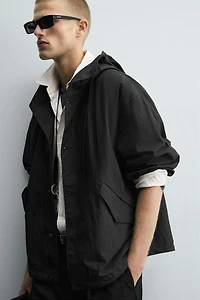 BLOUSON TECHNIQUE À CAPUCHE