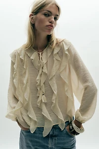 BLOUSE ROMANTIQUE À VOLANTS