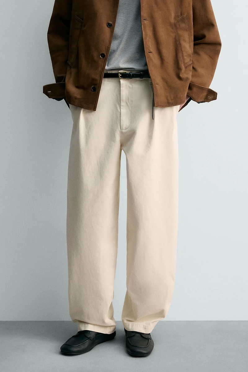 RELAXED FIT PLEATED PANTS