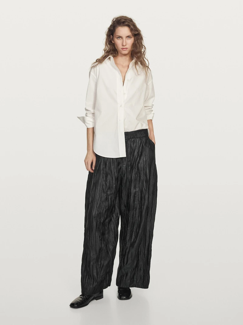 Creased pleated-effect wide-leg trousers