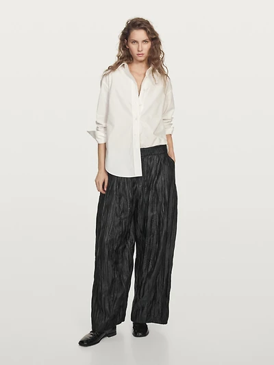 Creased pleated-effect wide-leg trousers