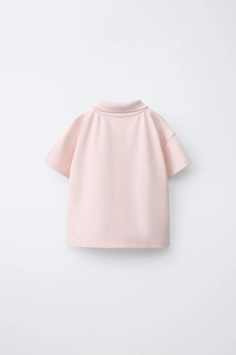 EMBROIDERED FLORAL PIQUÉ POLO