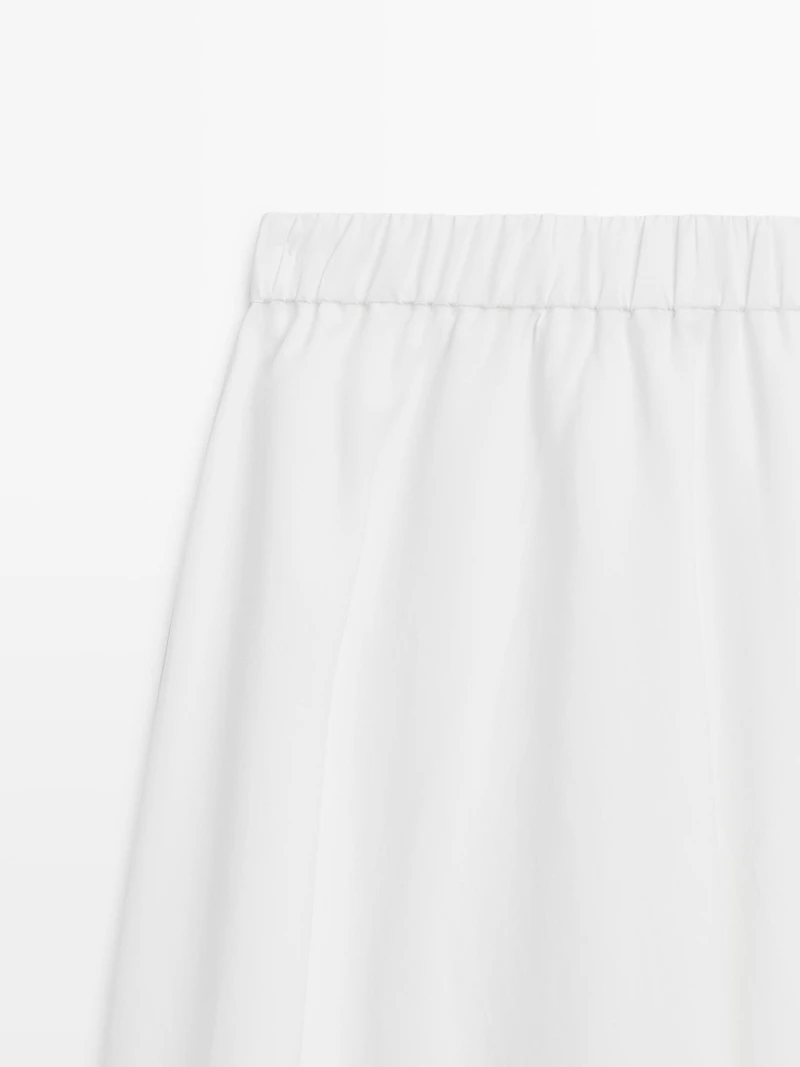 Flowing midi skirt with elastic detail