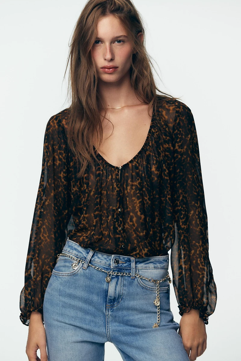 BLOUSE SEMI-TRANSPARENTE À IMPRIMÉ ANIMALIER