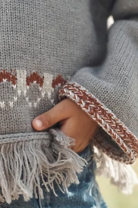 PULL PONCHO À FRANGES AVEC LAINE ÉDITION LIMITÉE