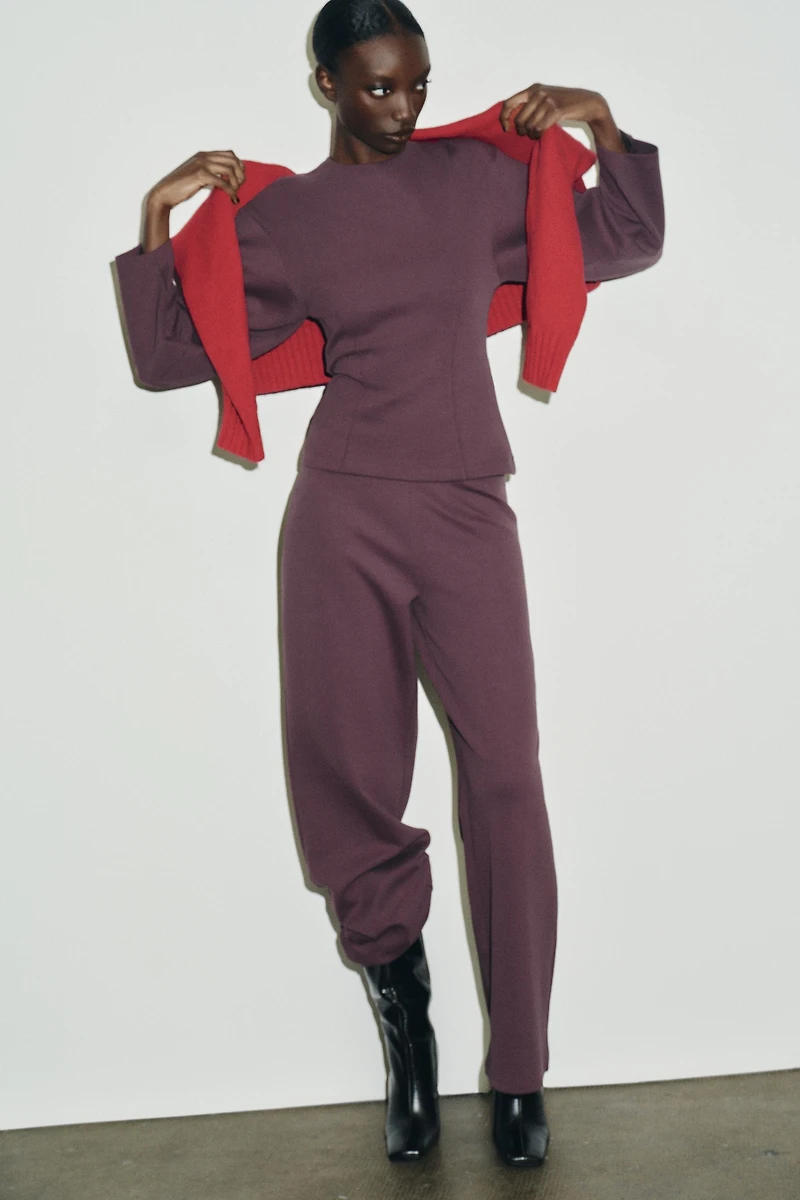 INTERLOCK JUMPER WITH DARTS