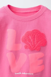 RUFFLY SHELL PATCH T-SHIRT