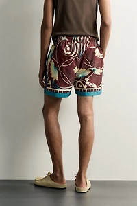LIMITED EDITION MIXED PRINT SWIM SHORTS