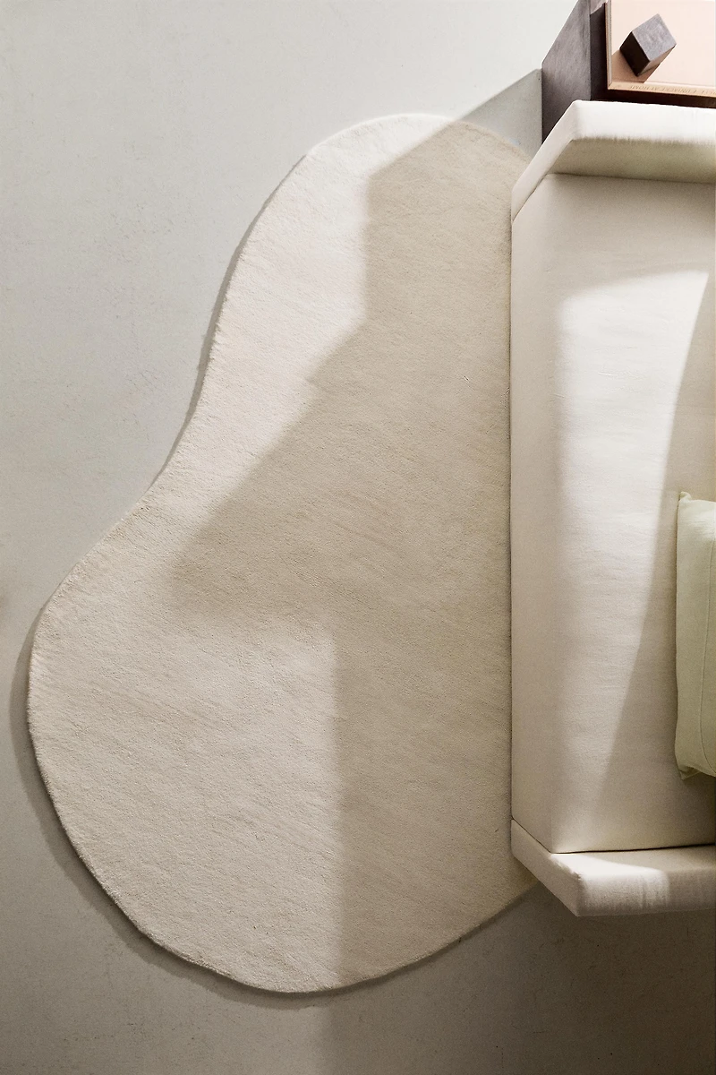 PLAIN IRREGULAR WOOL AREA RUG