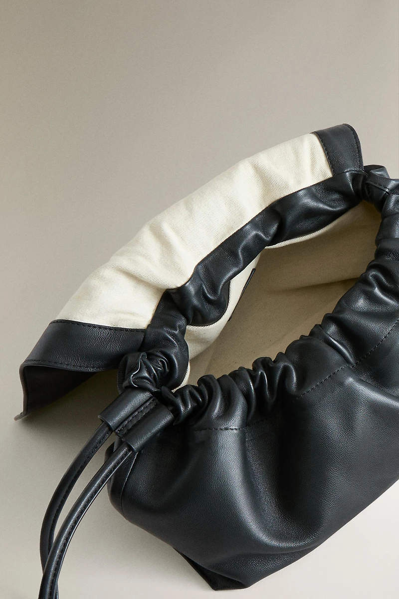 LEATHER POUCH MAKEUP BAG