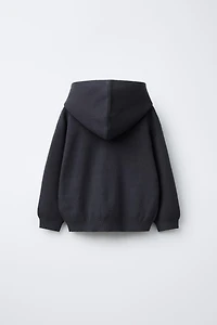 KNIT JUMPER WITH LETTER PATCH