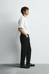 SLIM TAPERED FIT JEANS