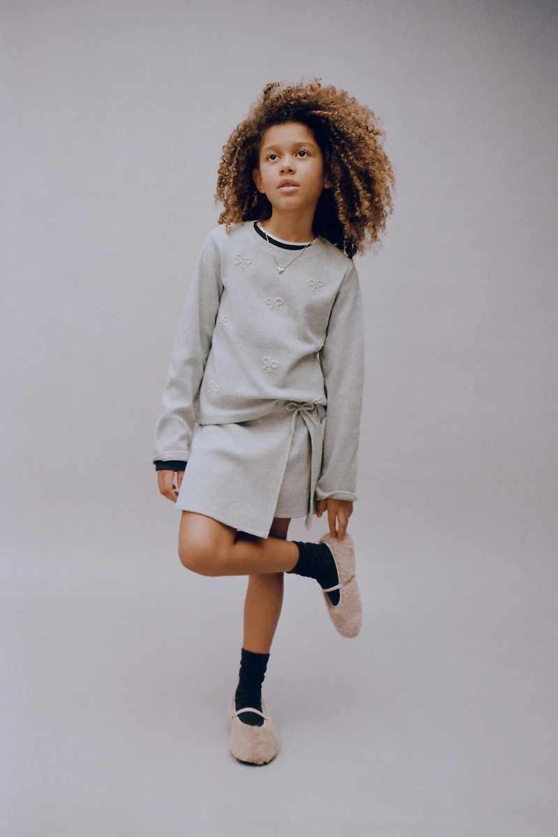 JUPE-SHORT DOUX AU TOUCHER AVEC NŒUD