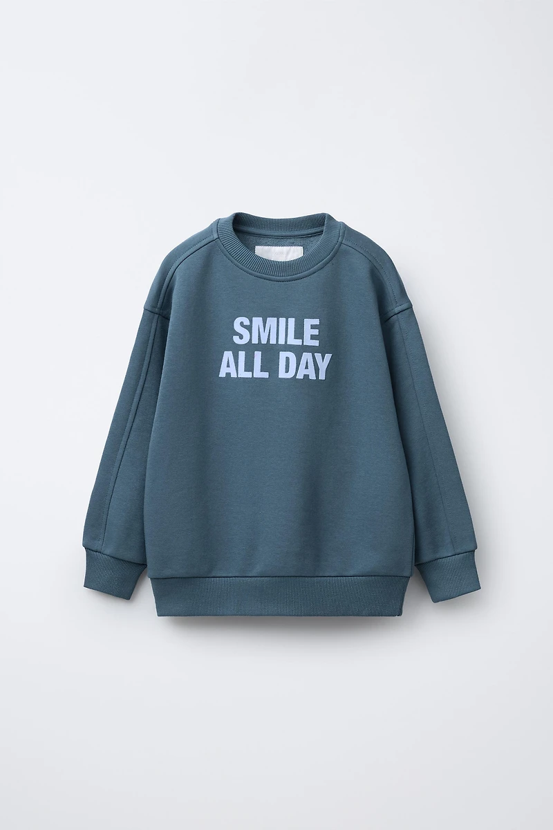 FLOCKED TEXT SWEATSHIRT