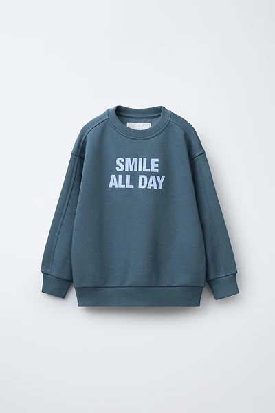 FLOCKED TEXT SWEATSHIRT